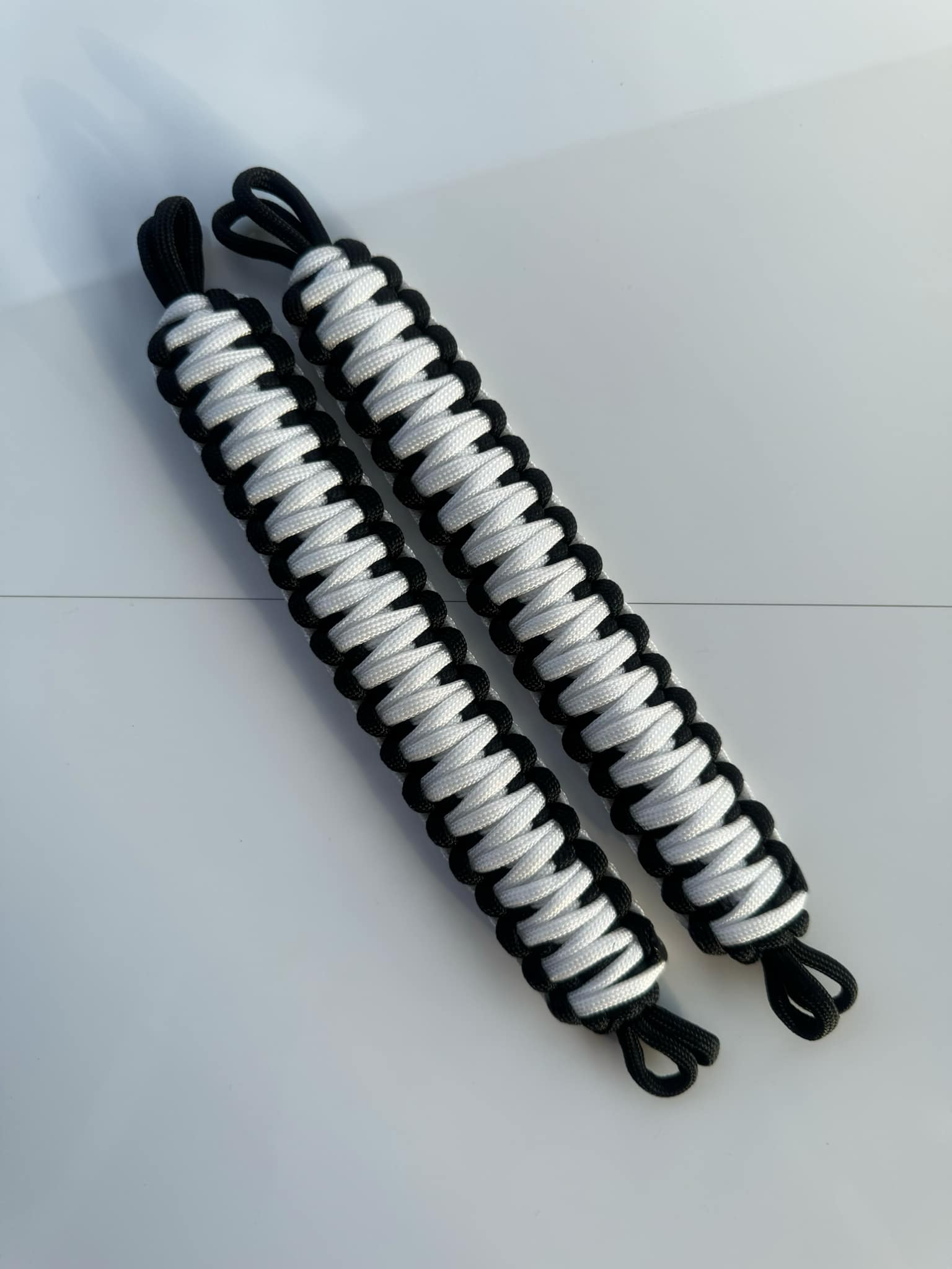 2x NMS PARACORD INTERIOR HANDLES (Pair) Black & White